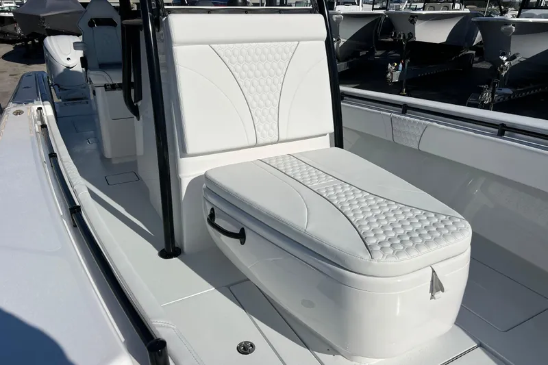  Yacht Photos Pics 2026 Contender 35 ST boat interior with white cushioned seating and sleek design.