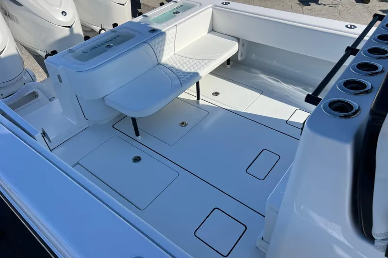  Yacht Photos Pics 2026 Contender 35 ST boat interior with seating and storage compartments.