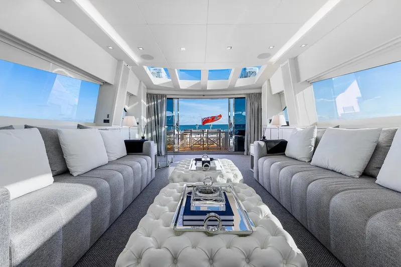 Skyfall Yacht Photos Pics Luxurious interior of 2008 Sunseeker Predator 108 yacht with elegant seating and ocean view.