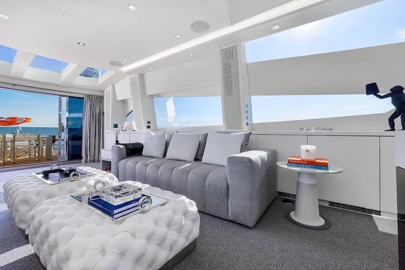 Skyfall Yacht Photos Pics Luxurious interior of 2008 Sunseeker Predator 108 yacht with modern decor and ocean view.