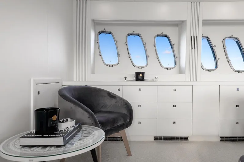 Skyfall Yacht Photos Pics Luxurious interior of 2008 Sunseeker Predator 108 yacht with modern furnishings and ocean view.