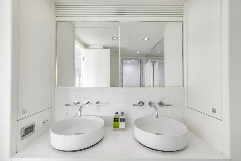 Skyfall Yacht Photos Pics Luxury yacht Sunseeker Predator 108 bathroom with dual sinks and modern design, 2008 model.