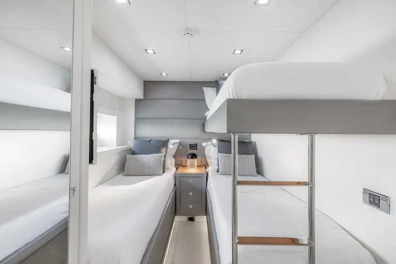 Skyfall Yacht Photos Pics Luxurious cabin interior of 2008 Sunseeker Predator 108 yacht with modern bunk beds.