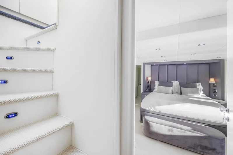 Skyfall Yacht Photos Pics Luxurious bedroom and staircase inside 2008 Sunseeker Predator 108 yacht.