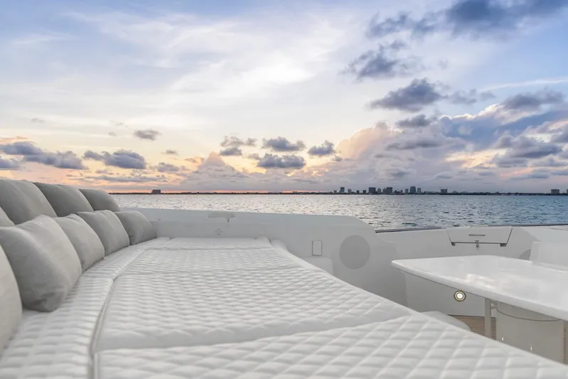 Skyfall Yacht Photos Pics Luxurious Sunseeker Predator 108 yacht deck with ocean view at sunset, 2008 model.