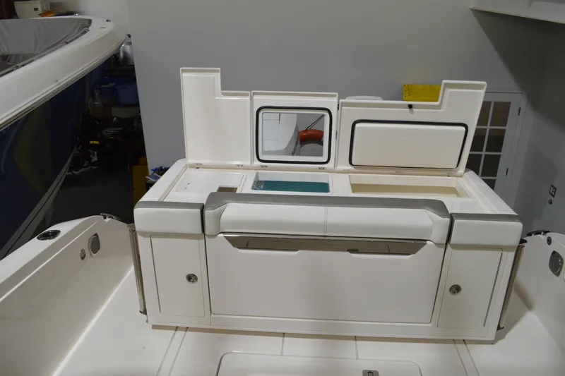 Hopena Yacht Photos Pics 2024 Tiara Yachts 34 LS boat interior with storage compartments and seating.