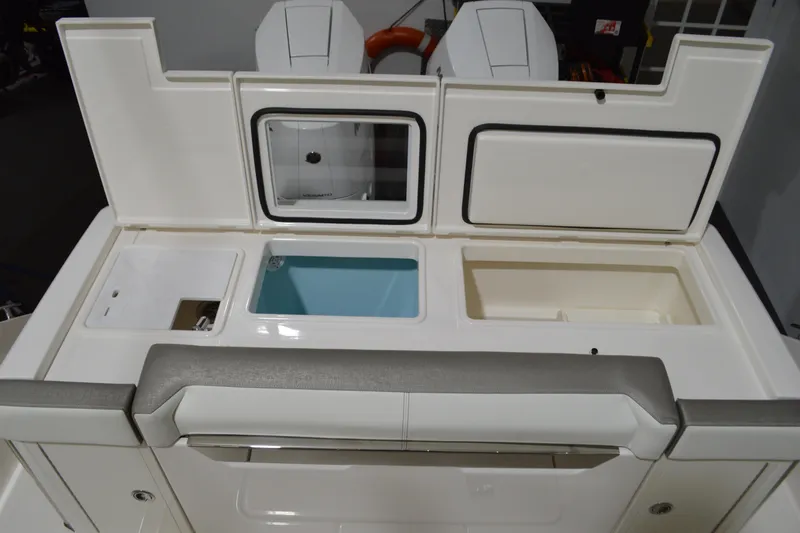 Hopena Yacht Photos Pics 2024 Tiara Yachts 34 LS boat interior with storage compartments and seating.