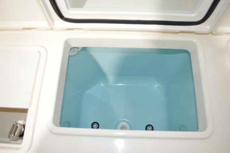 Hopena Yacht Photos Pics 2024 Tiara Yachts 34 LS livewell with open lid, showcasing interior design.