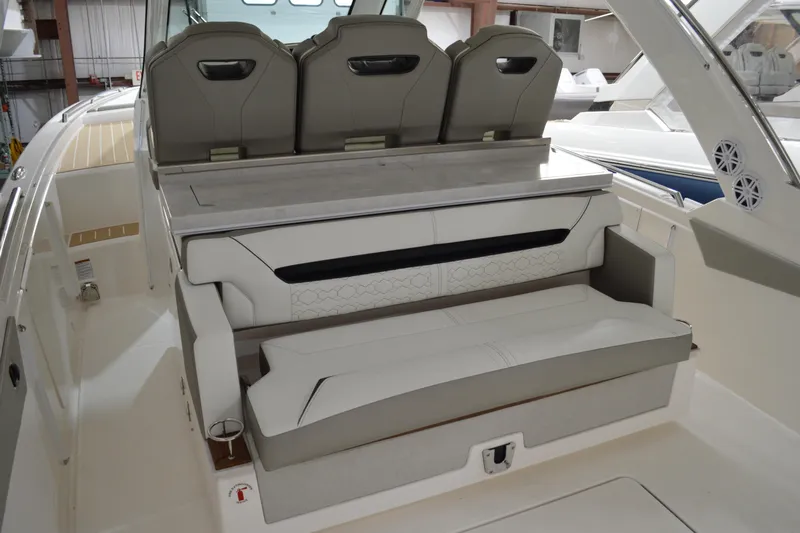 Hopena Yacht Photos Pics 2024 Tiara Yachts 34 LS interior seating with modern design and luxurious finishes.