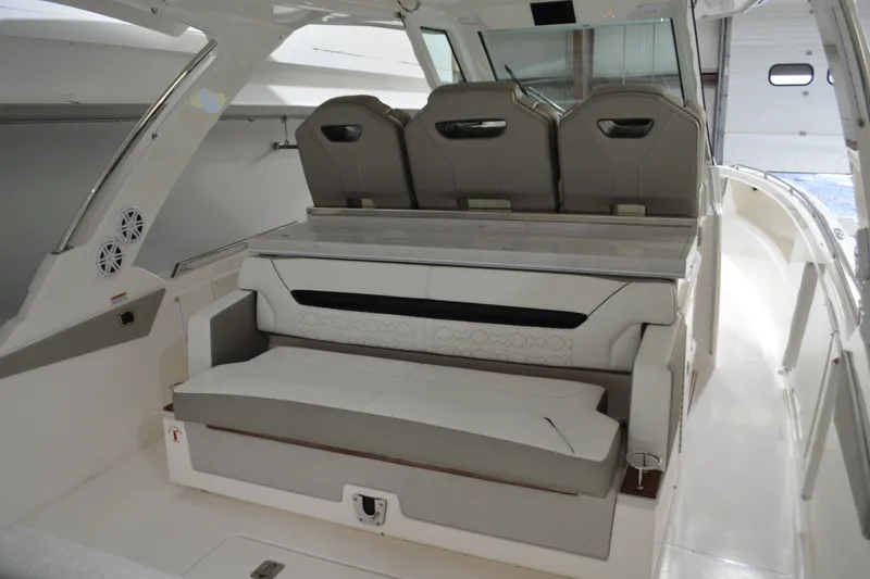 Hopena Yacht Photos Pics 2024 Tiara Yachts 34 LS interior with luxurious seating and modern design.