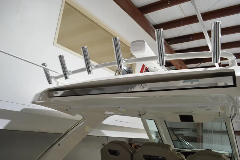 Hopena Yacht Photos Pics 2024 Tiara Yachts 34 LS boat interior with rod holders and modern design.