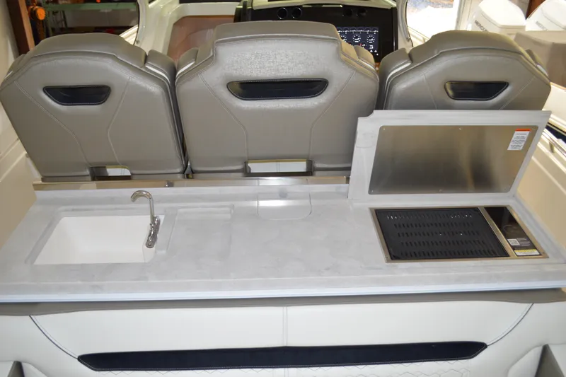 Hopena Yacht Photos Pics 2024 Tiara Yachts 34 LS interior with sink and grill station.