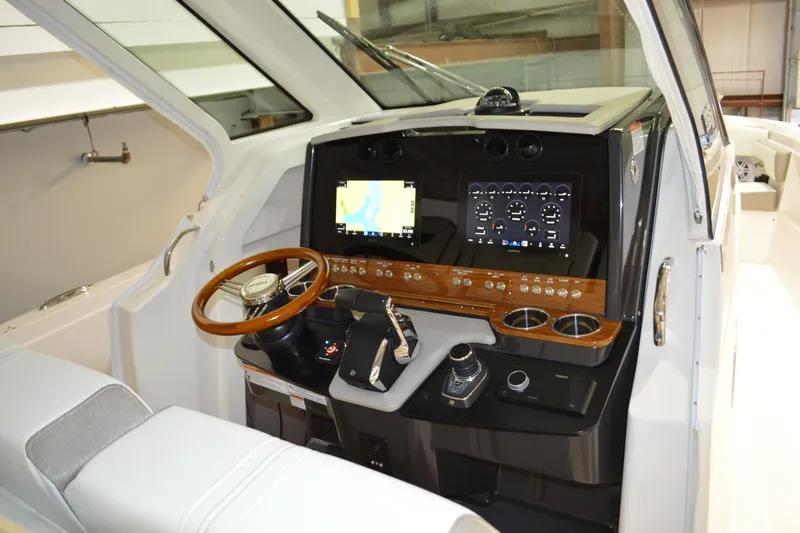 Hopena Yacht Photos Pics 2024 Tiara Yachts 34 LS helm with modern navigation and control systems.