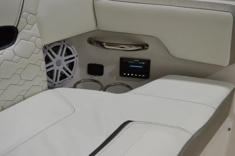 Hopena Yacht Photos Pics Luxurious interior of 2024 Tiara Yachts 34 LS with premium seating and audio system.