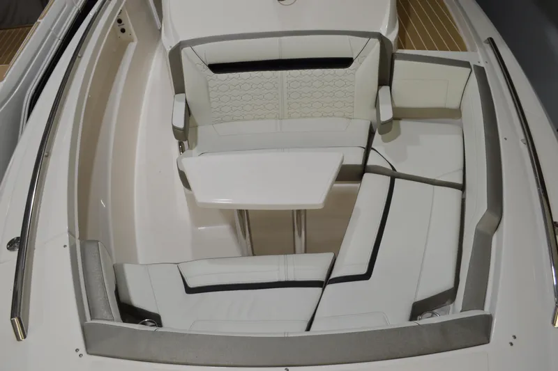 Hopena Yacht Photos Pics 2024 Tiara Yachts 34 LS boat interior with white seating and table.