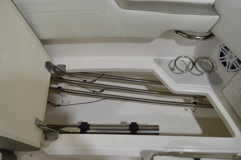 Hopena Yacht Photos Pics 2024 Tiara Yachts 34 LS interior storage with rod holders and cup holders.