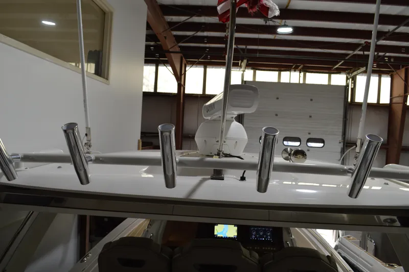 Hopena Yacht Photos Pics 2024 Tiara Yachts 34 LS interior view with rod holders and navigation equipment.