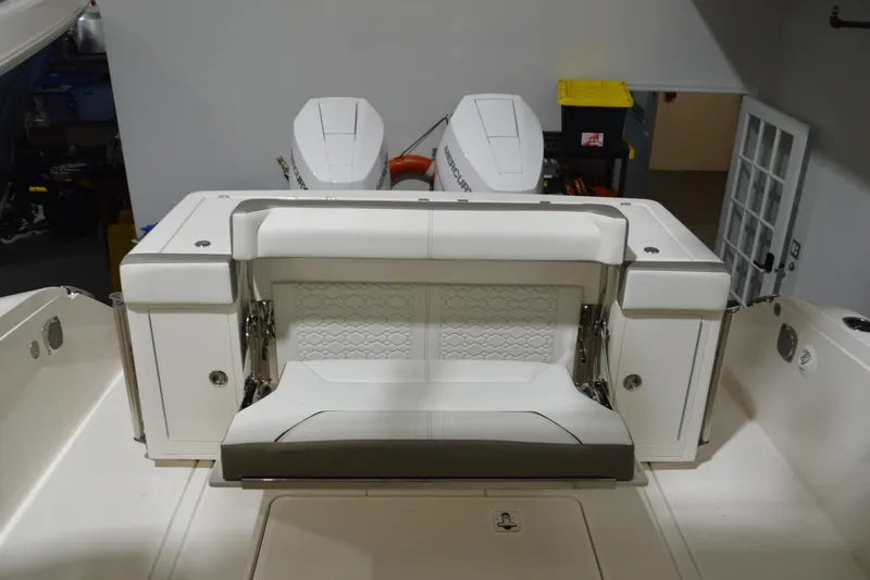 Hopena Yacht Photos Pics 2024 Tiara Yachts 34 LS boat interior with seating and dual outboard engines.