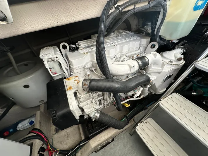 Mother Ship Yacht Photos Pics Engine compartment of 2011 Meridian 441 Sedan Bridge, showcasing detailed mechanical components.