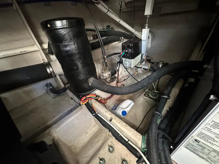 Mother Ship Yacht Photos Pics Engine room of 2011 Meridian 441 Sedan Bridge, showcasing wiring and components.