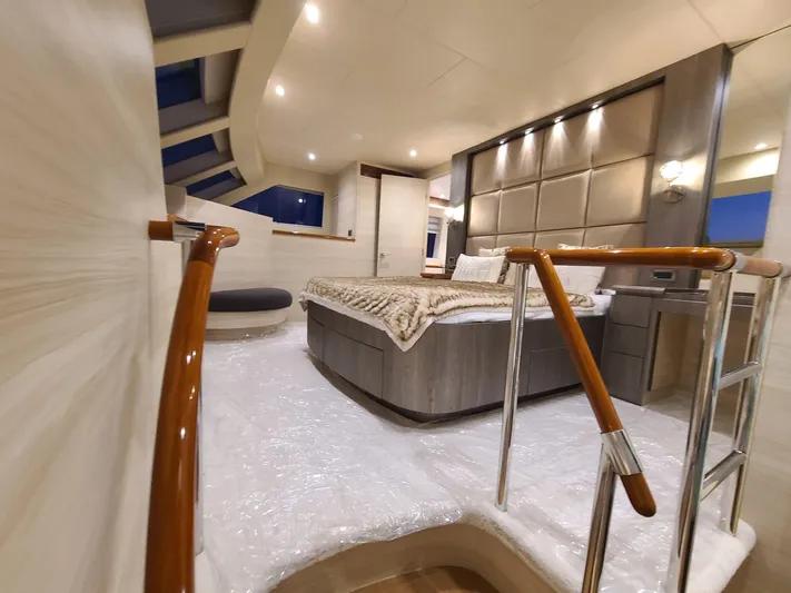  Yacht Photos Pics Luxurious interior of a 2017 Horizon PC60 yacht with elegant bedroom design.