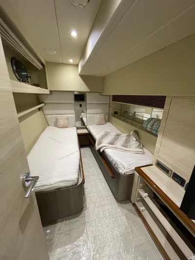  Yacht Photos Pics 2017 Horizon PC60 yacht cabin with twin beds and modern interior design.