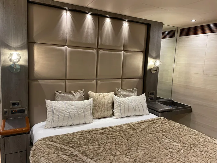  Yacht Photos Pics Luxurious bedroom interior in 2017 Horizon PC60 yacht with plush bedding and modern lighting.