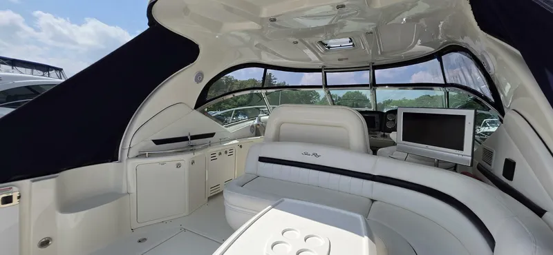  Yacht Photos Pics Luxurious interior of 2008 Sea Ray 44 Sundancer yacht with plush seating and modern amenities.
