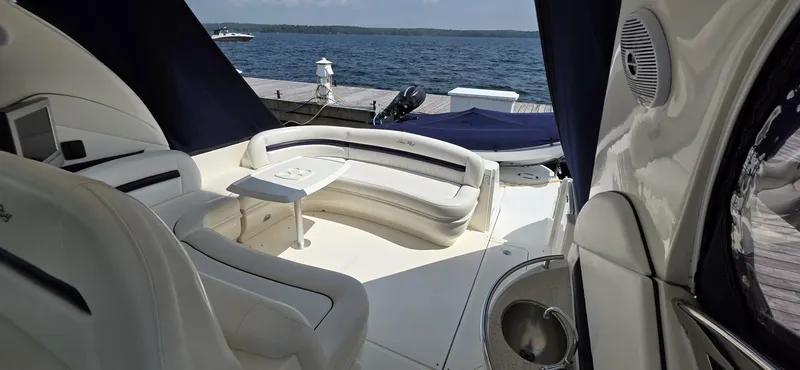  Yacht Photos Pics Luxurious 2008 Sea Ray 44 Sundancer yacht interior with elegant seating and scenic water view.