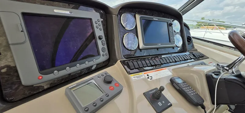  Yacht Photos Pics Control panel of 2008 Sea Ray 44 Sundancer yacht with navigation instruments and gauges.