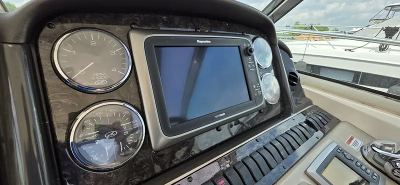  Yacht Photos Pics Dashboard of a 2008 Sea Ray 44 Sundancer with navigation instruments and gauges.
