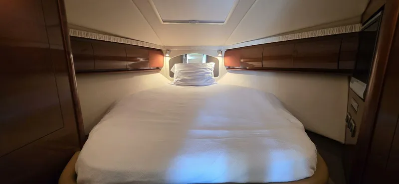  Yacht Photos Pics Luxurious cabin interior of 2008 Sea Ray 44 Sundancer yacht with cozy bed.