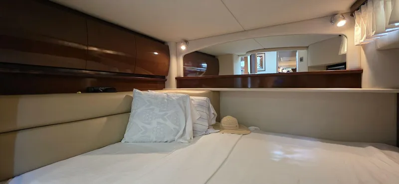  Yacht Photos Pics Luxurious cabin interior of 2008 Sea Ray 44 Sundancer yacht with cozy bedding.