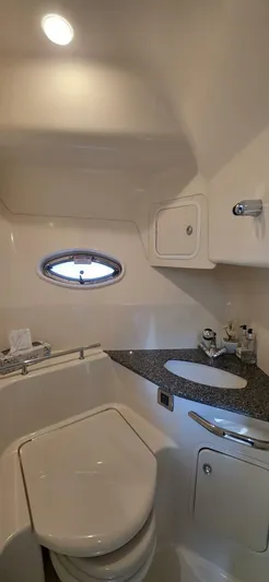  Yacht Photos Pics 2008 Sea Ray 44 Sundancer bathroom with modern fixtures and compact design.