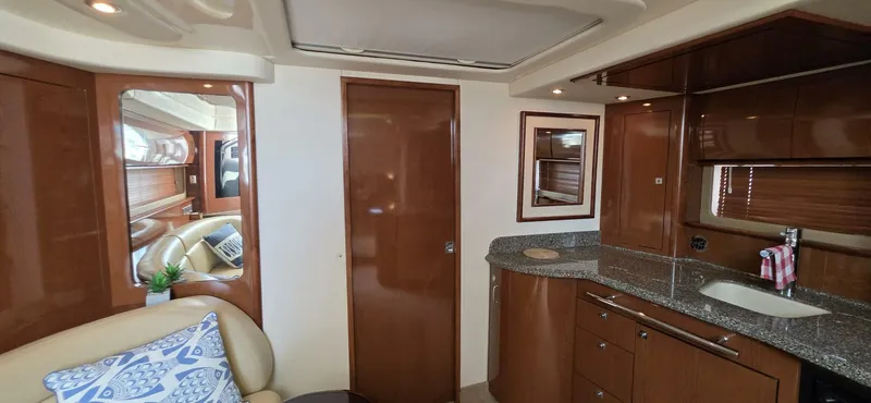  Yacht Photos Pics Interior of 2008 Sea Ray 44 Sundancer yacht with modern kitchen and seating area.