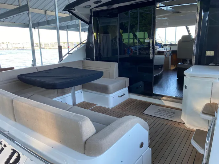  Yacht Photos Pics 2015 Sea Ray 510 Sundancer yacht with spacious outdoor seating and elegant interior.