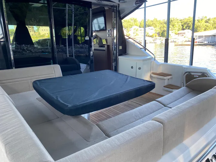  Yacht Photos Pics Luxurious 2015 Sea Ray 510 Sundancer yacht interior with spacious seating and table.
