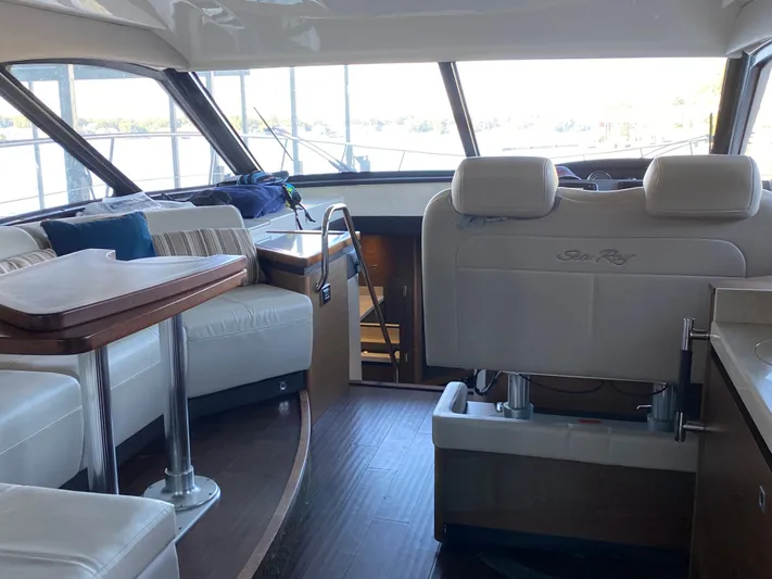  Yacht Photos Pics Interior of 2015 Sea Ray 510 Sundancer yacht with luxurious seating and panoramic windows.