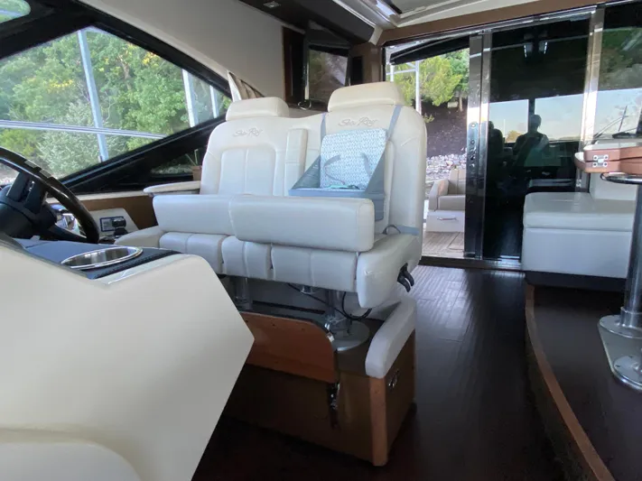  Yacht Photos Pics Luxurious interior of 2015 Sea Ray 510 Sundancer yacht with plush seating.