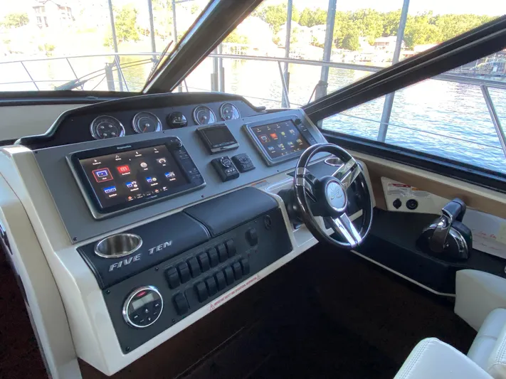  Yacht Photos Pics 2015 Sea Ray 510 Sundancer helm with modern navigation displays and controls.
