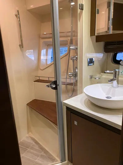  Yacht Photos Pics Luxurious bathroom in 2015 Sea Ray 510 Sundancer yacht with modern fixtures and shower.