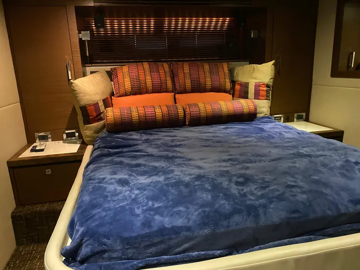  Yacht Photos Pics Luxurious bedroom interior of 2015 Sea Ray 510 Sundancer yacht with plush bedding.