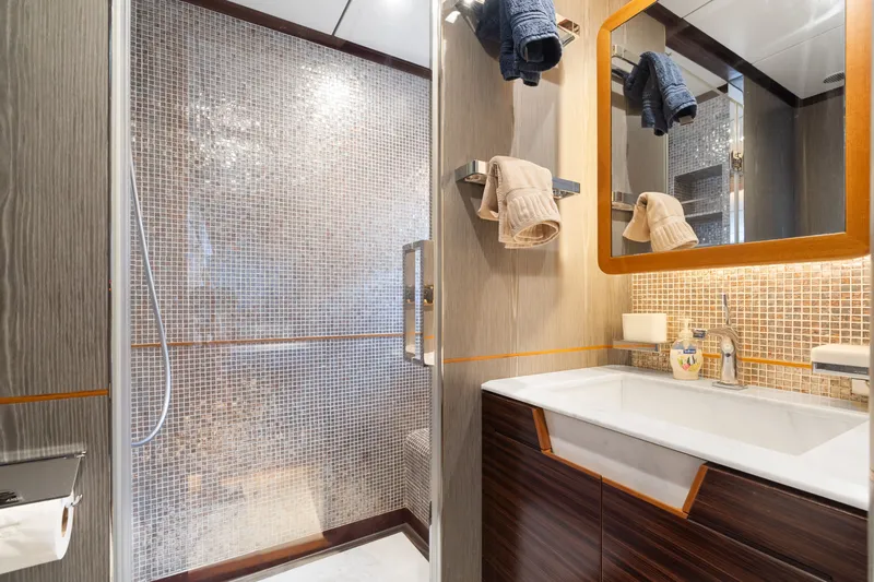 Wild Duck Yacht Photos Pics Luxurious yacht bathroom with mosaic tiles, modern vanity, and elegant fixtures, Horizon RP110, 2019.
