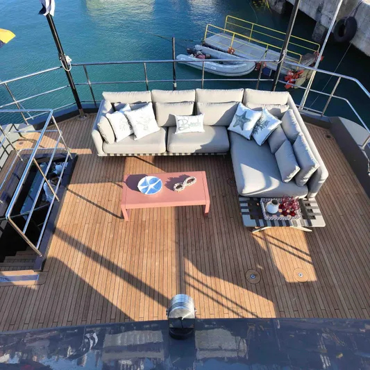  Yacht Photos Pics Luxurious deck of 2027 Inace AVENTURA 106 yacht with cozy seating and ocean view.