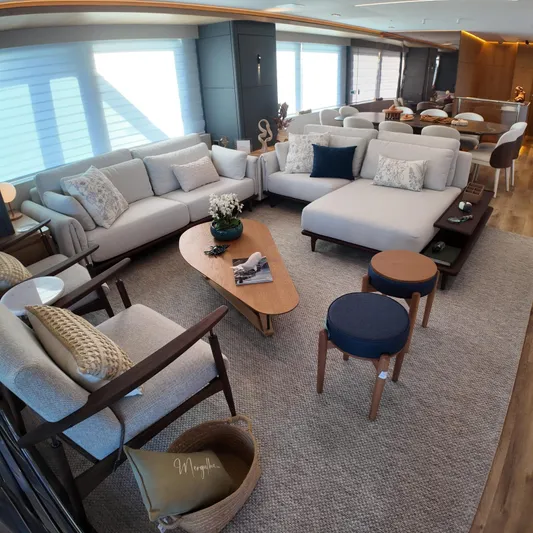  Yacht Photos Pics Luxurious interior of Inace AVENTURA 106 yacht, featuring elegant seating and modern decor, 2027 model.