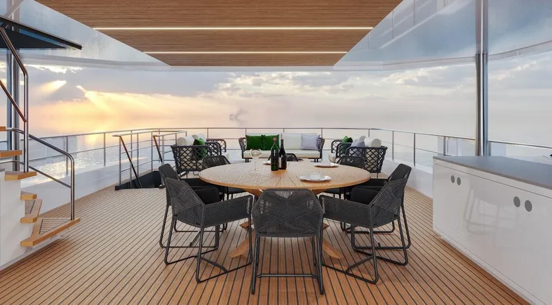  Yacht Photos Pics Luxurious deck of 2027 Inace AVENTURA 106 yacht with ocean view and elegant seating.