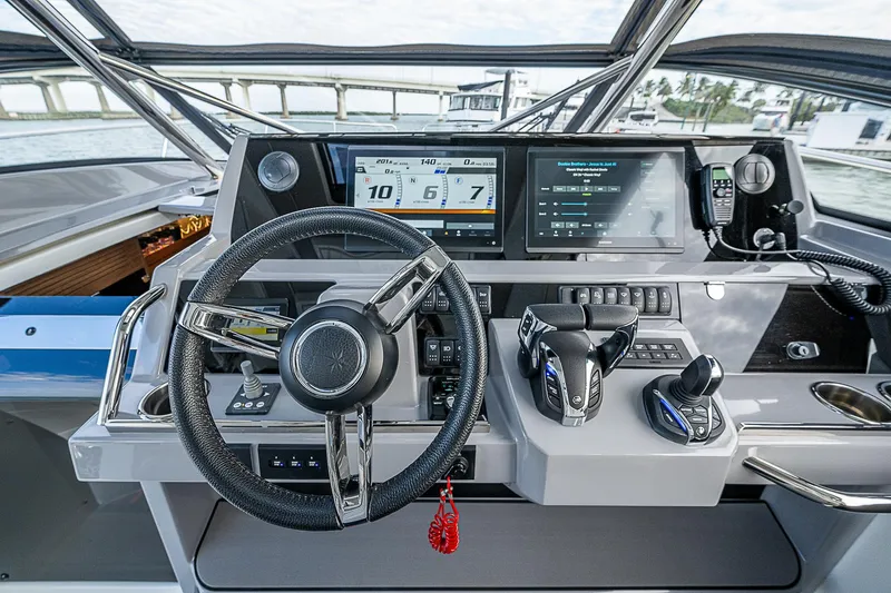 Brama Sole Yacht Photos Pics Cockpit of 2022 Jeanneau Leader 12.5 with advanced navigation controls and displays.