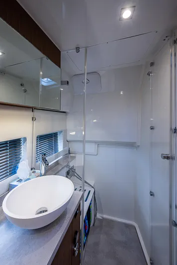 Brama Sole Yacht Photos Pics Modern bathroom interior on 2022 Jeanneau Leader 12.5 yacht, featuring sleek design and fixtures.