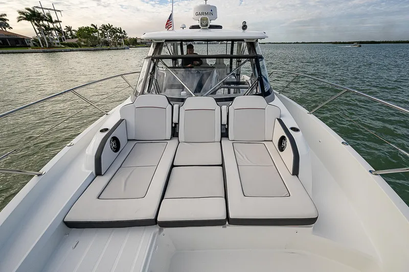 Brama Sole Yacht Photos Pics 2022 Jeanneau Leader 12.5 boat with spacious deck seating on calm water.
