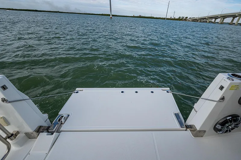 Brama Sole Yacht Photos Pics 2022 Jeanneau Leader 12.5 boat swim platform on calm water.